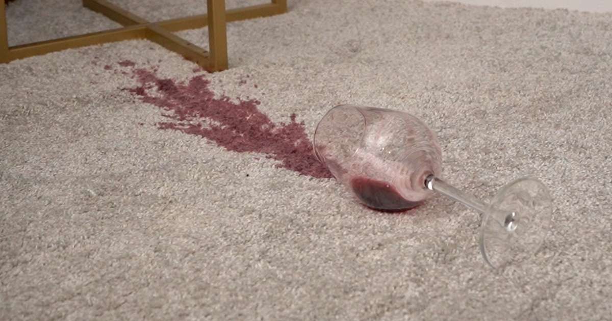 Red wine stain on carpet Spilled red wine stain on white upholstery